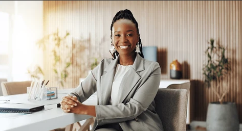 Corporate professional working on laptop at A2B Connect